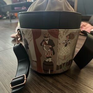 Disney parks haunted mansion stretching portraits bag!